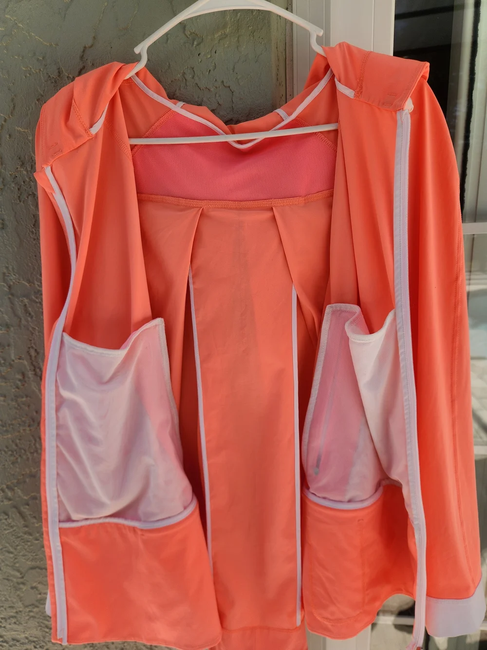 Lululemon Sun Showers Jacket in the color Watermelon Coral/White. Size 8